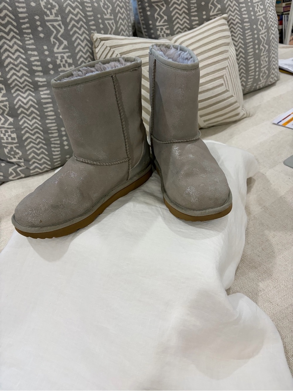 UGG Women's Short Shearling Boots in Light Gray with silver sparkle- Tan Sole